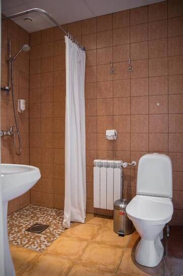 Фото номера Дом с 2 спальнями Гостевой дом Posti Hostel г. Кярдла 18